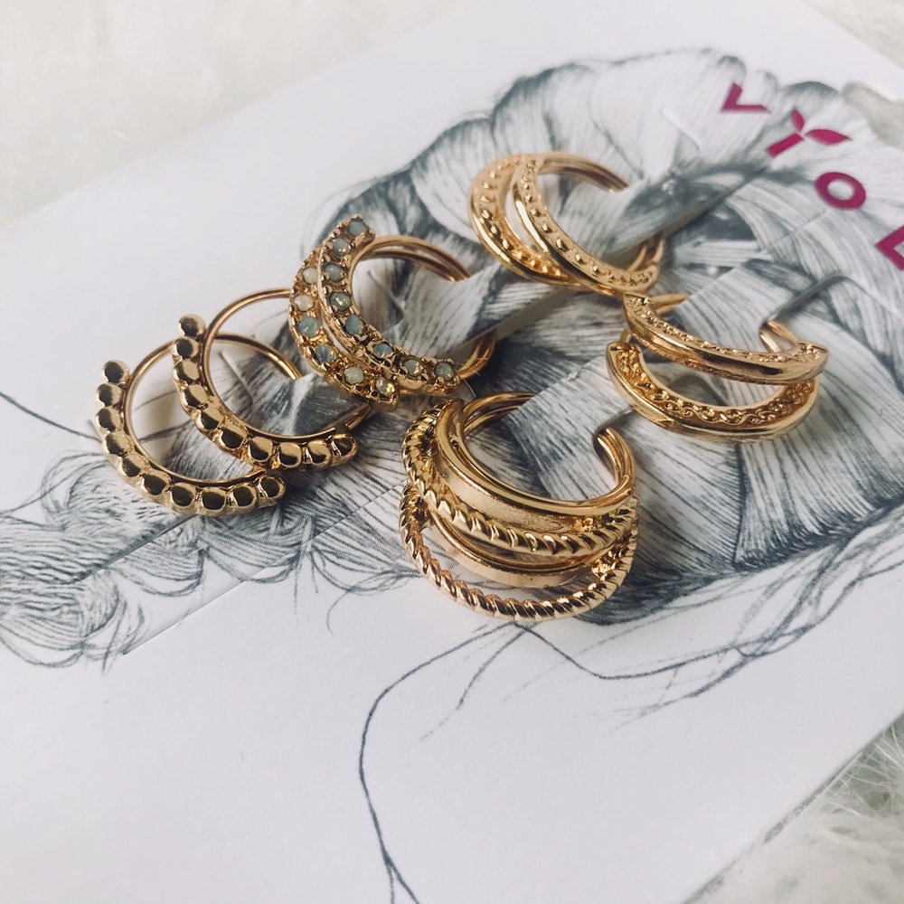 10 gold hair rings.